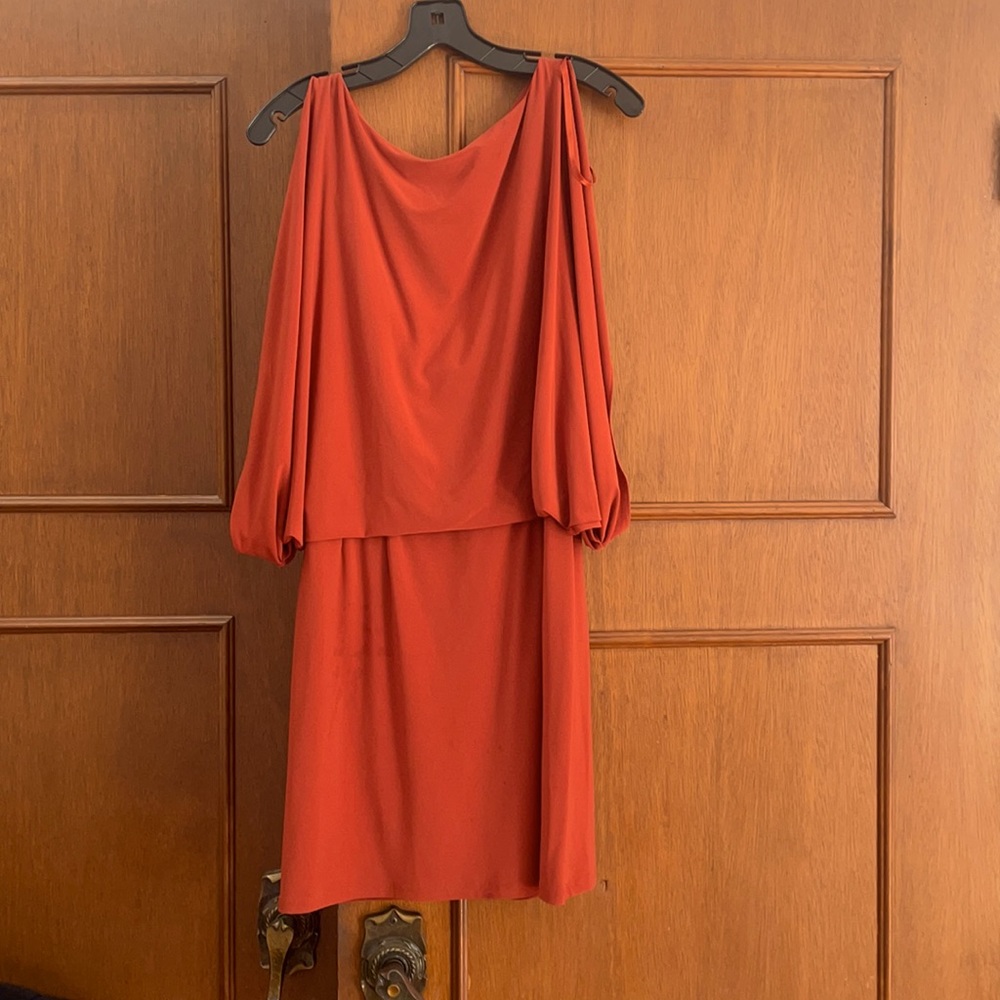 Orange dress with a bit of open back Jessica Simpson